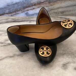 Black and gold Tory Burch pumps